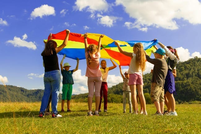 children camp entertainment activity, education and training idyllic wallpaper poster concept in picturesque sunny green nature landscape environment space